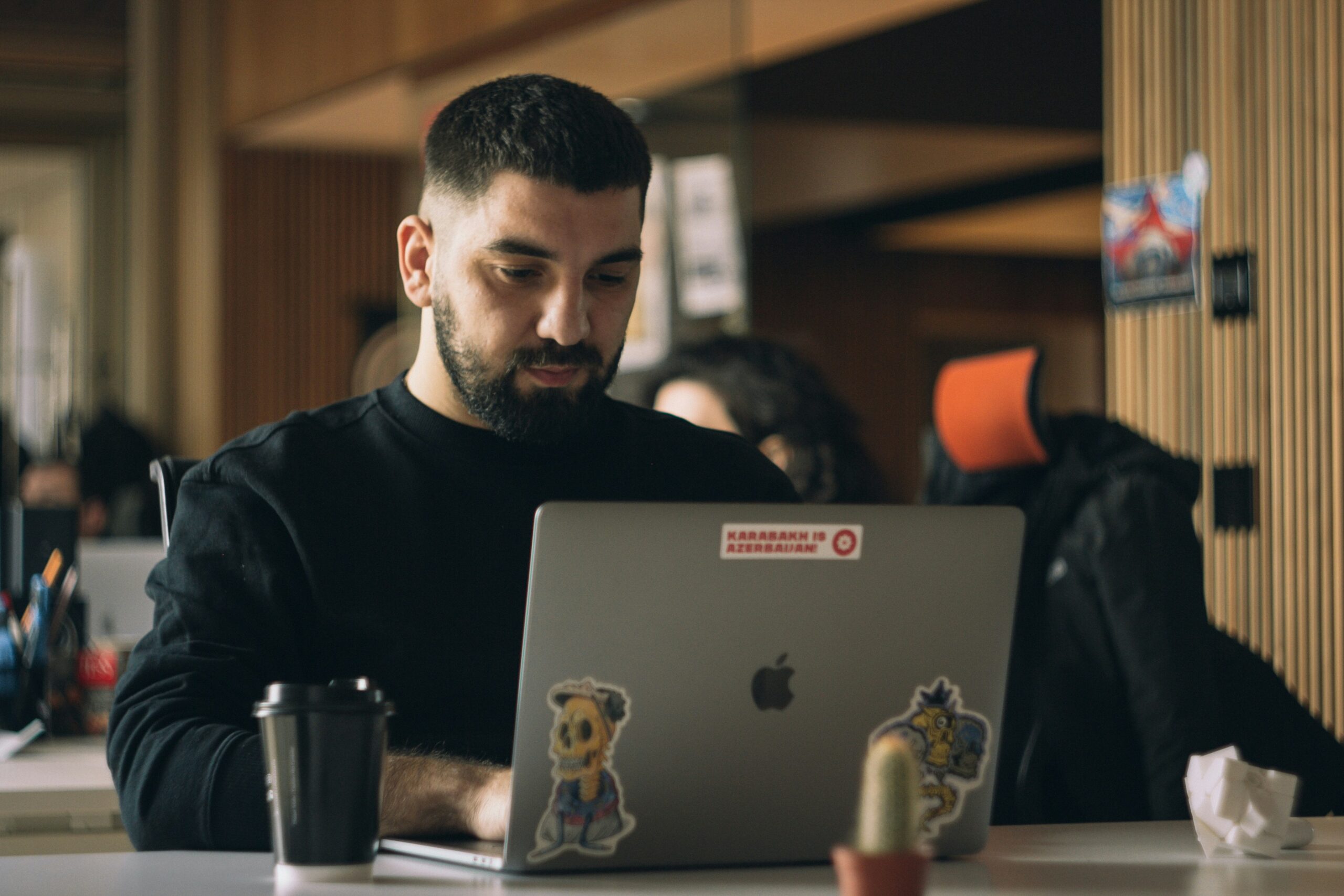 man working on laptop